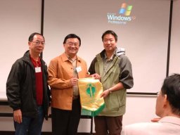 Presentation of souvenir to Wetland Park staff s